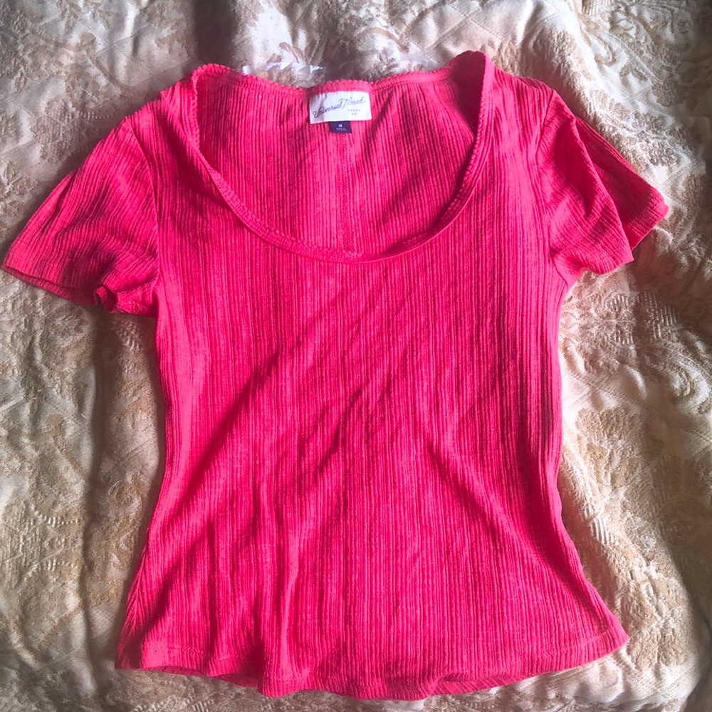 This is a regular pink t shirt and is very casual